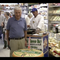 Saul Zabar celebrating his 82nd birthday at his eponymous grocery store in 2010. (Screenshot from YouTube)